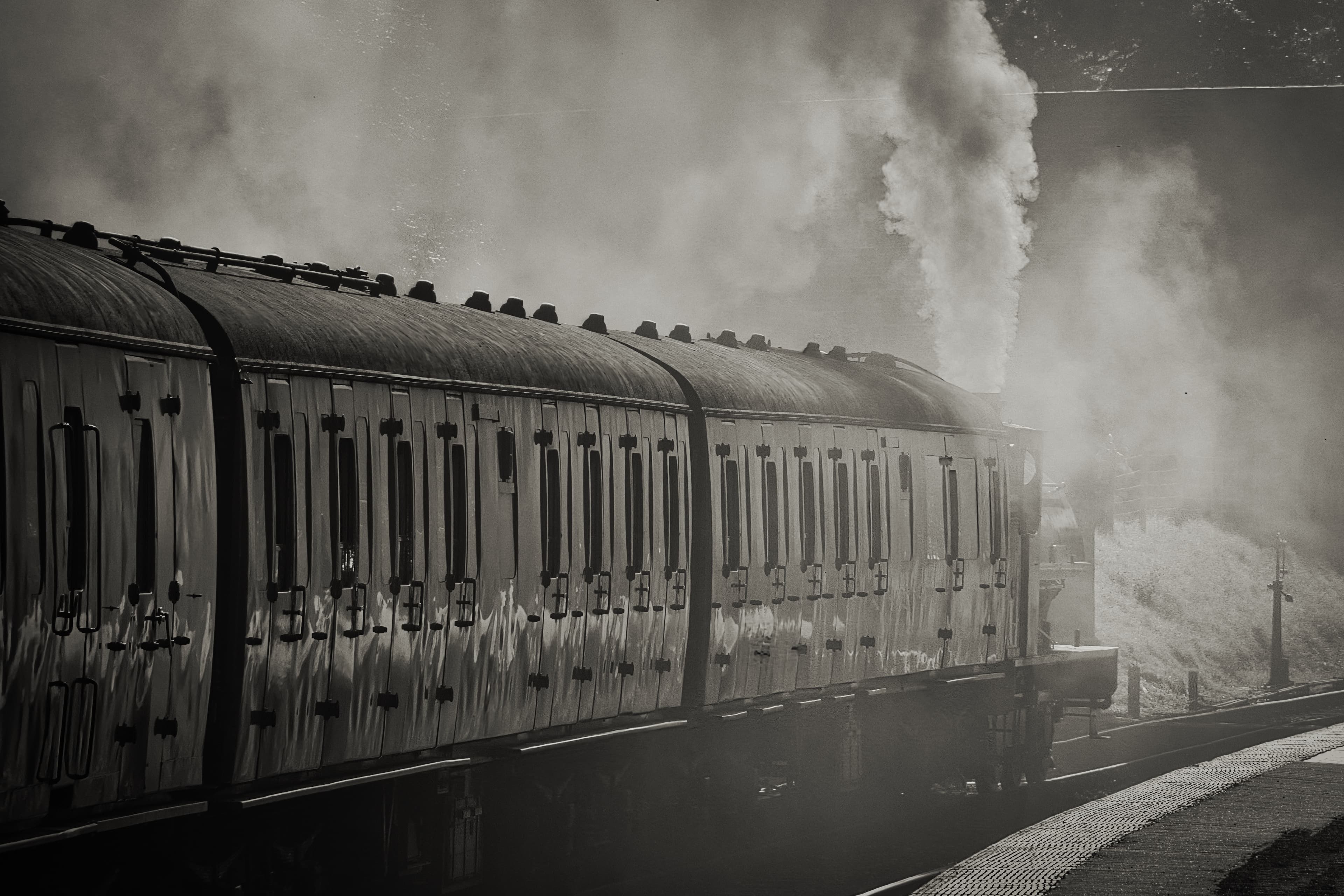 Steam train in smoke.