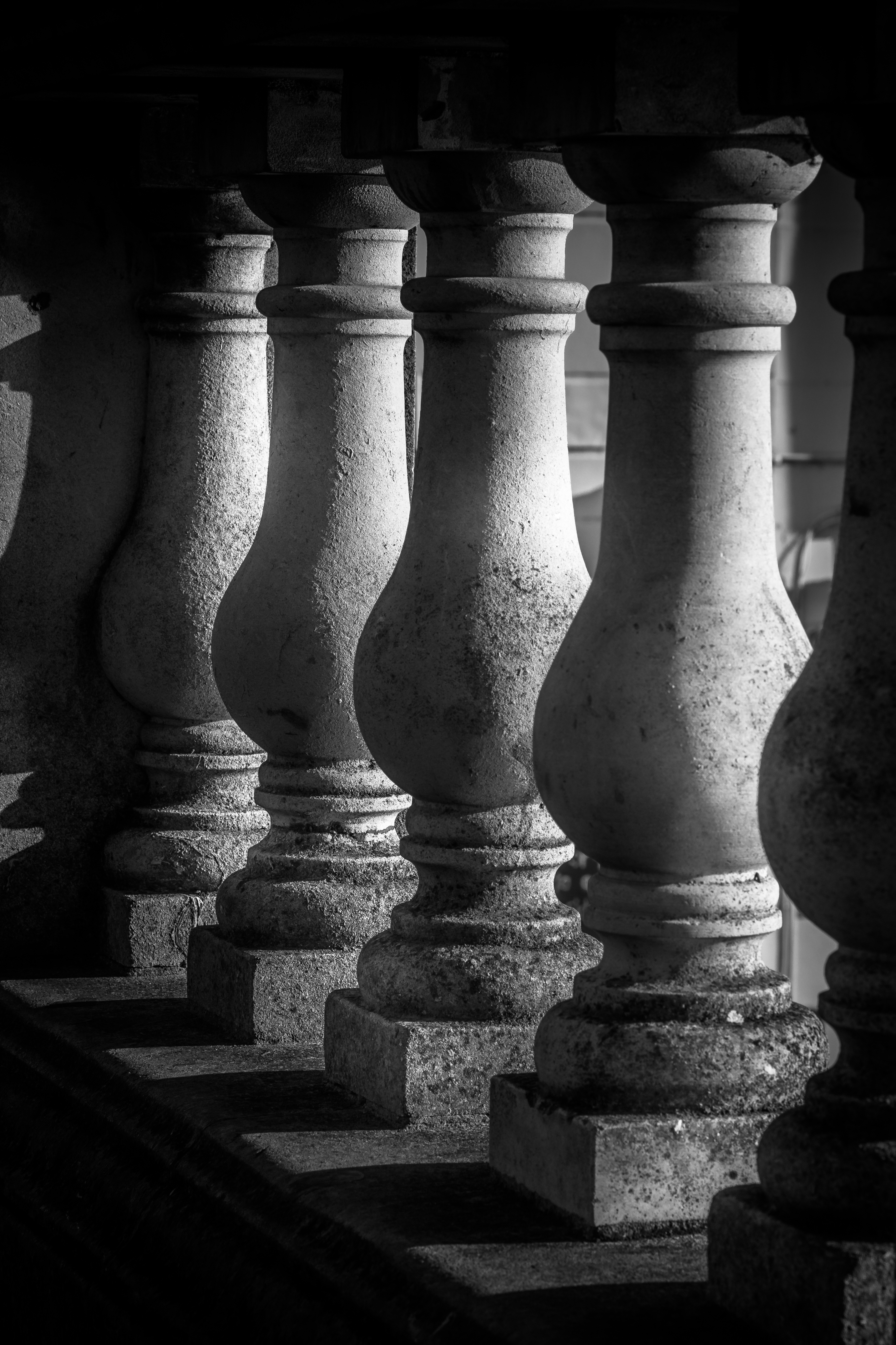 This striking black and white photograph captures the timeless elegance of a balustrade, where the interplay of light and shadow creates a illusion of floating columns. The composition is both minimalist and dramatic, with the interplay of light and shadow evoking a sense of mystery and depth. The aesthetic appeal lies in its ability to transform any space into a a focal point, whether it be a living room, executive office, or modern gallery wall. The monochromatic palette ensures it complements a variety of interior styles, making it a perfect piece for those seeking a sophisticated and artistic touch.