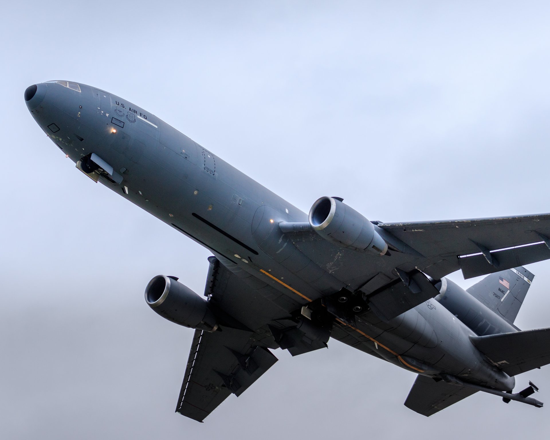 Capture the essence of aviation and adventure with this stunning fine-art photograph of a KC-135 Stratotanker in moment of flight. The image, bathed in soft, natural light, evokes a sense of freedom and exploration, making it a perfect focal point for any living room or executive office. Its sleek, modern composition and rich, deep tones make it an ideal addition to a modern gallery wall, enhancing any room with its dynamic and inspiring presence.
